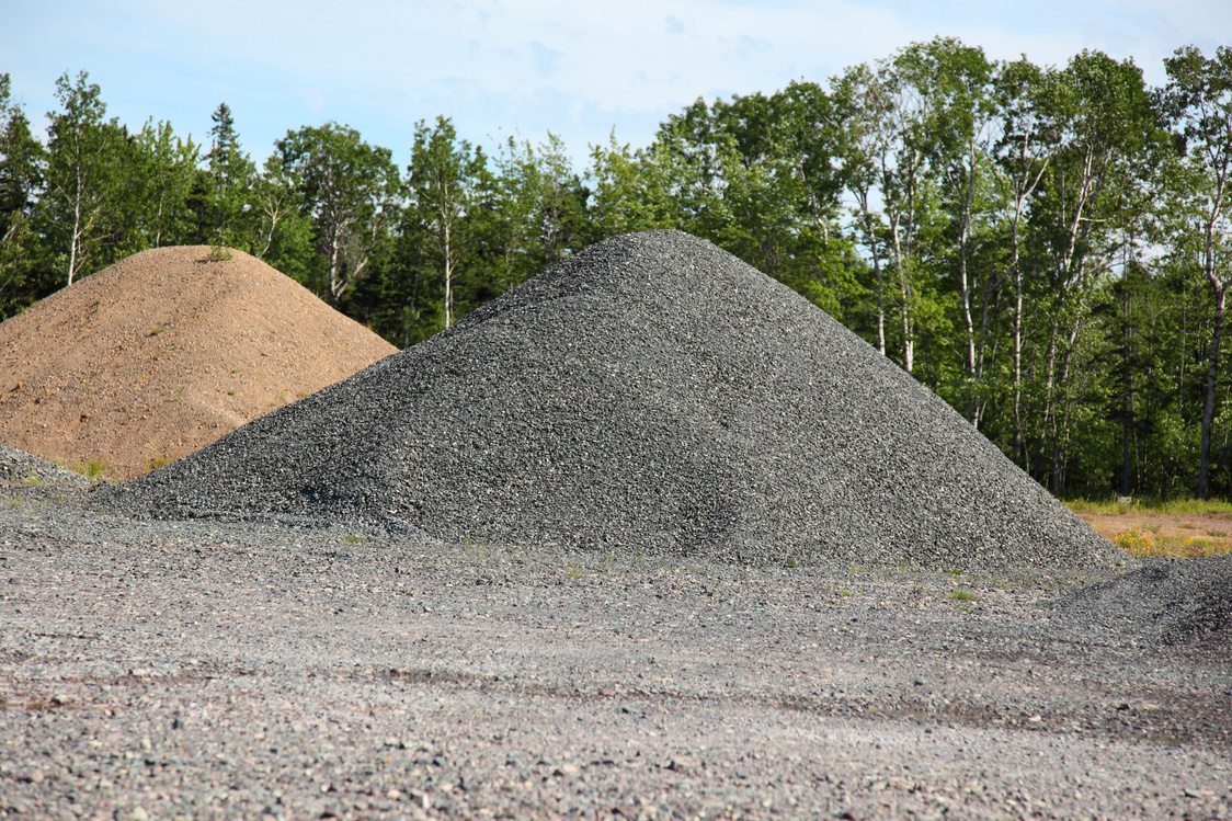 Piles of construction material, gravel, aggregate